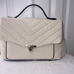 Hang bag by a NEW DAY  BEIGE COLOR & Black trim,gold.